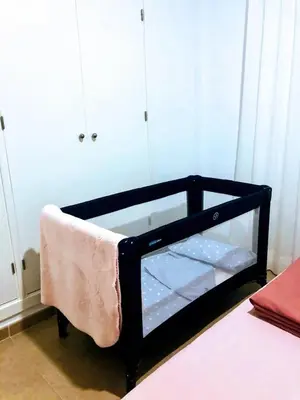 Cama o camas de una habitación en Apartamentos Vida Almería