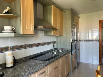 Una cocina o zona de cocina en San Miguel Apartamentos