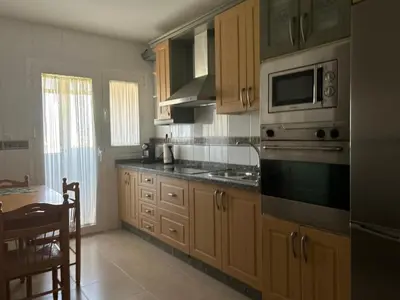 Una cocina o zona de cocina en San Miguel Apartamentos
