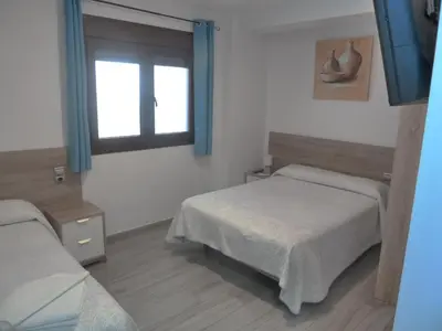 Cama o camas de una habitación en Hostal Casa Fermina- A 2 horas de las pistas de esquí