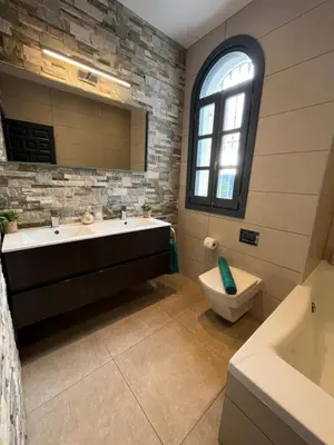Un baño de Villa with HEATED Pool and Amazing Mountain and Sea Views No Young Groups Allowed