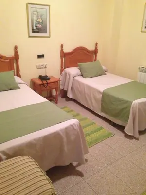 Cama o camas de una habitación en Hotel Venta del Pobre