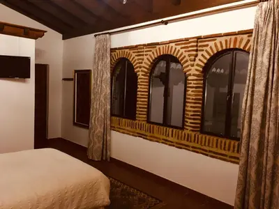 Cama o camas de una habitación en HABITACIONES LAS TERMAS