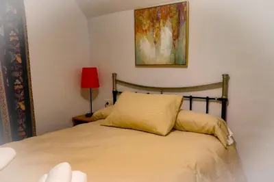 Cama o camas de una habitación en Cueva la kililla