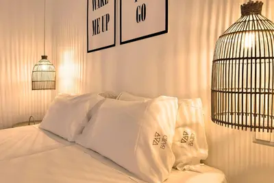 Cama o camas de una habitación en Hostal Bajío