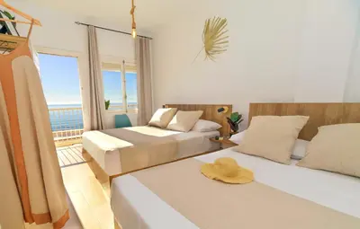 Cama o camas de una habitación en Maxcaly Playa