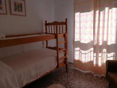 Cama o camas de una habitación en PISO CON VISTAS AL MAR