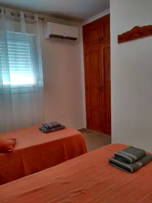 Cama o camas de una habitación en ApartRoquetas
