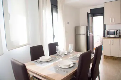 Una cocina o zona de cocina en Apartamentos EL POSAERO Juan Mariano