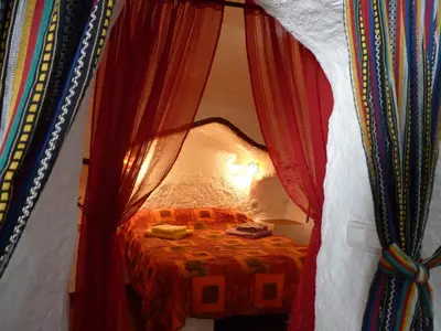 Cama o camas de una habitación en Cueva Las Rosas-VTAR/GR/02108