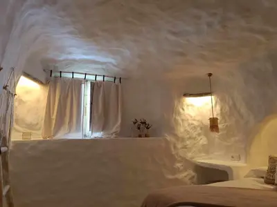 Cama o camas de una habitación en Cueva OTTO Familiar Privada