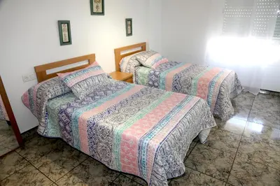 Cama o camas de una habitación en AMPLIO APTO en ROQUETAS