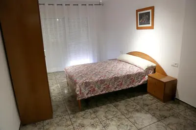 Cama o camas de una habitación en AMPLIO APTO en ROQUETAS