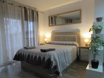 Cama o camas de una habitación en GARRUCHA HOME AND BEACH