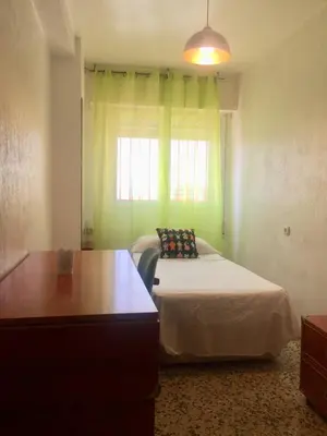 Cama o camas de una habitación en Apartamento San Juan Bosco