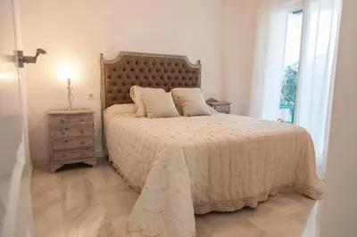 Cama o camas de una habitación en Coqueto Apartamento con vistas al mar y piscina