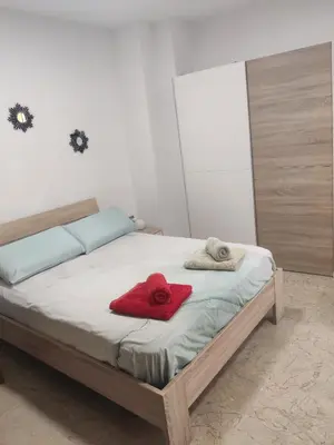 Cama o camas de una habitación en playa Almería zapillo loft