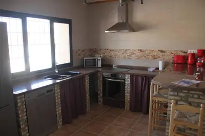 Una cocina o zona de cocina en CUEVAS AL ANDALUS - Solea