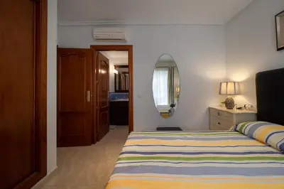 Cama o camas de una habitación en Casas-VeraPlaya Casa Marisol Al Andalus Thalassa