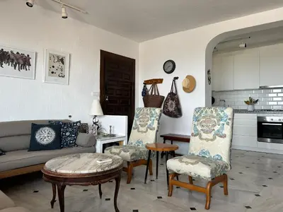 Una cocina o zona de cocina en Apartment with a great terrace, sea and land views
