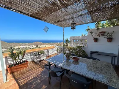 Un balcón o terraza de Apartment with a great terrace, sea and land views