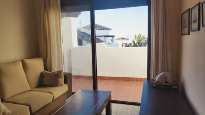 Zona de estar de Vera playa apartamento 1dormitorio