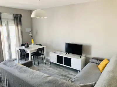 Una televisión o centro de entretenimiento en Apartamento Algazul