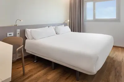 Cama o camas de una habitación en B&B HOTEL Almería Vicar
