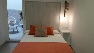 Cama o camas de una habitación en Hostal Cervantes Playa