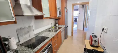 Una cocina o zona de cocina en Homes of Spain, Precioso apartamento Pueblo Salinas S, Vera playa, WIFI
