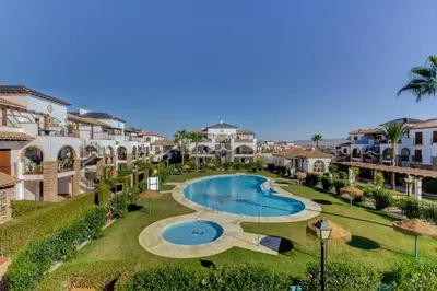 Piscina en o cerca de Homes of Spain, Al Andalus Residencial JA Apartamento bajo en frente piscina, WIFI