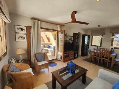 Zona de estar de Attic apartment in Vera Beach with wifi and air-conditioning