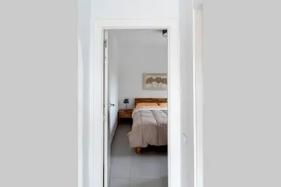 Cama o camas de una habitación en TurAlmeria - Casa Tranquila con Jardín y Aparcamiento privado