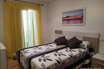 Cama o camas de una habitación en APARTAMENTO Al Andalus Residencial