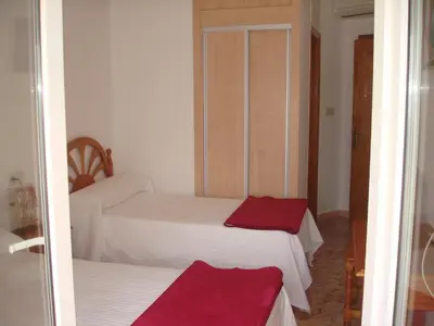 Cama o camas de una habitación en Pensión sol y playa