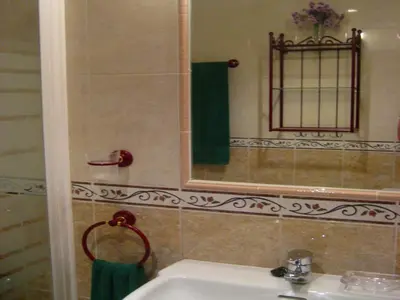 Un baño de Vivienda en residencial con piscina