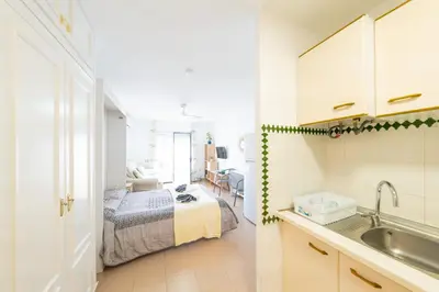 Cama o camas de una habitación en Estudio Tres Pinos. Piscina, Junto al mar