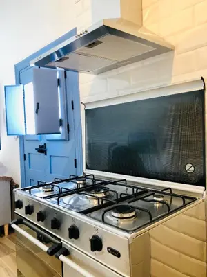 Una cocina o zona de cocina en Damajuana ll