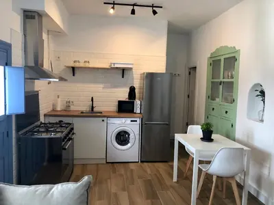 Una cocina o zona de cocina en Damajuana ll
