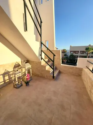 Un balcón o terraza de Ático dúplex precioso con piscina privada en Paraíso de Vera!