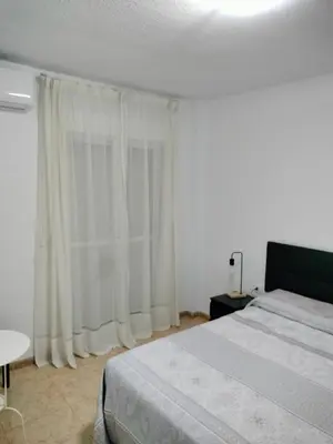 Cama o camas de una habitación en Alojamiento las Dunas
