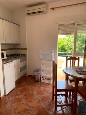 Una cocina o zona de cocina en Apartamentos Carolina