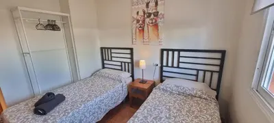 Cama o camas de una habitación en Homes of Spain, Apartamentos Paraíso Vera Playa, Ed Fatu Hiva Bajo con PISCINA PRIVADA y jardín privado en PRIMERA LINEA de Vera Playa, WIFI