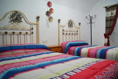 Cama o camas de una habitación en Cuevas de María