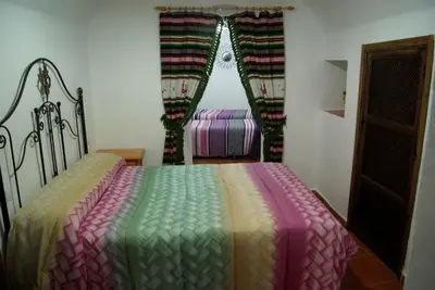 Cama o camas de una habitación en Cuevas de María