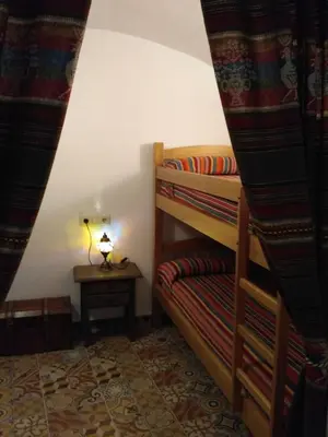 Cama o camas de una habitación en Casa Cueva EL ZAGAL