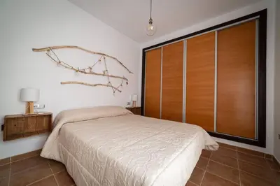 Cama o camas de una habitación en Apartamento relajante con vistas al atardecer en Águilas