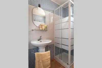 Un baño de Apartamento relajante con vistas al atardecer en Águilas