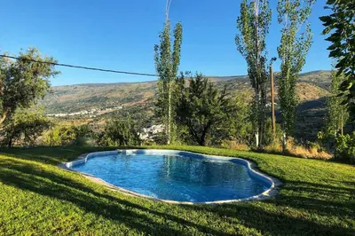 Piscina en o cerca de Casa El Higueral