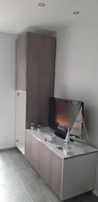 Una televisión o centro de entretenimiento en Estudio PREMIUM Vera Playa Naturista